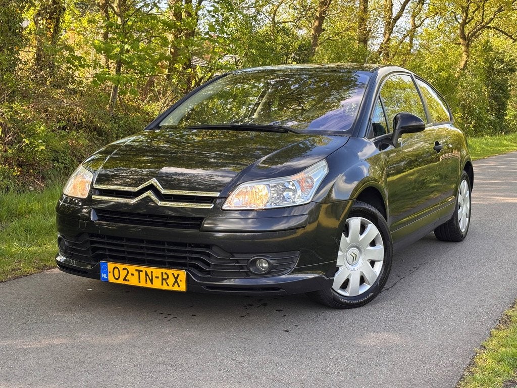 Citroen C4 Coupé 1.6-16V Image | Airco + Cruise control Nu, Voorwielaandrijving, Gebruikt, 4 cilinders, Zwart