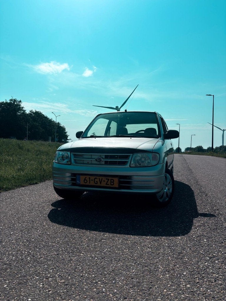 Daihatsu Cuore 1.0 STI 2001 Grijs, Stof, 600 kg, 18 €/maand, 4 stoelen