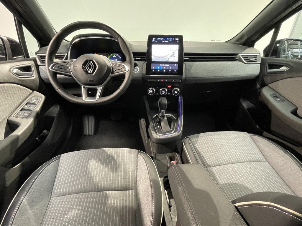 Renault Clio 1.6 E-Tech Full Hybrid 145 techno | 360° Camer, Gebruikt, Met garantie (alle), Leder en Stof, Zwart