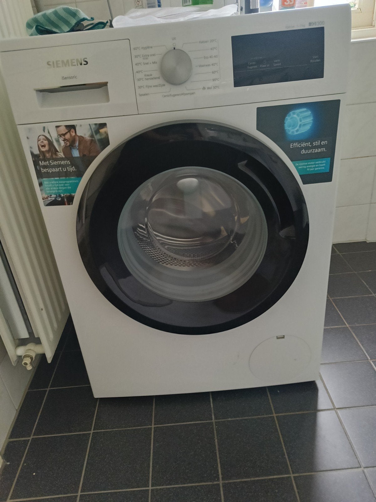 Siemens iQdrive 7kg wasmachine - Efficiënt en stil, Ophalen, Zo goed als nieuw, Voorlader, 1200 tot 1600 toeren