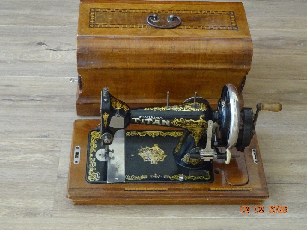 oude naaimachine merk titan., Ophalen