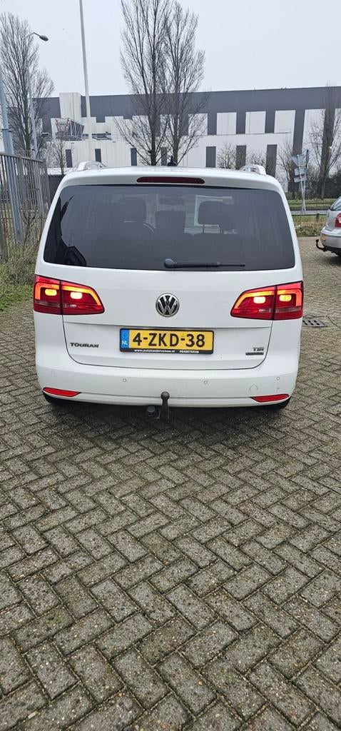 Volkswagen Touran 1.2 TSI 77KW BMT 7P 2015 Wit, Auto's, Voorwielaandrijving, 74 €/maand, 4 cilinders, 7 stoelen