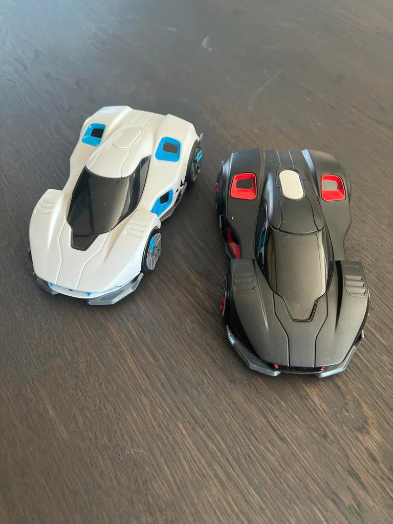 WowWee R.E.V. slimme robot raceauto's (2 stuks), Ophalen, Zo goed als nieuw, Afstandsbediening