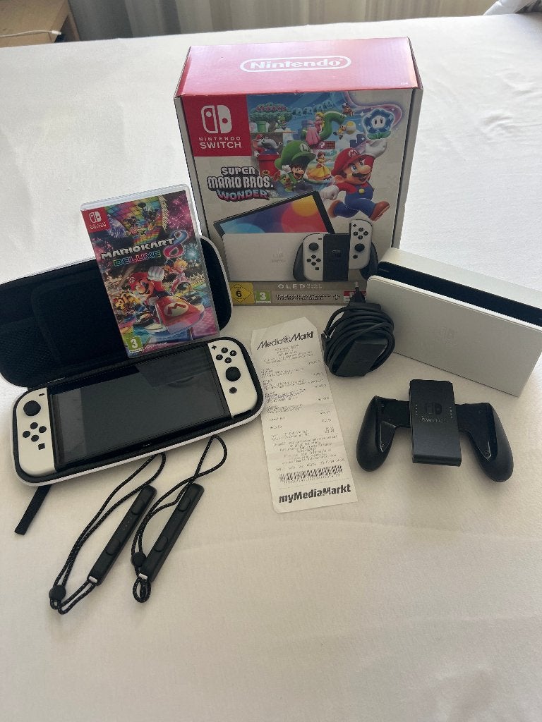 Nintendo Switch OLED (wit), Met games, Met 2 controllers, Zo goed als nieuw, Switch OLED