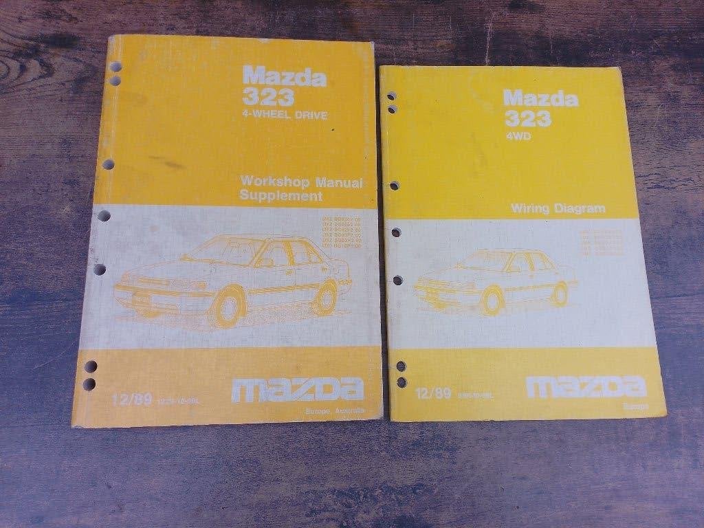Mazda 323 4WD 1989 dealer werkplaatsboeken complete auto, Boeken, Verzenden, Gelezen, Mazda