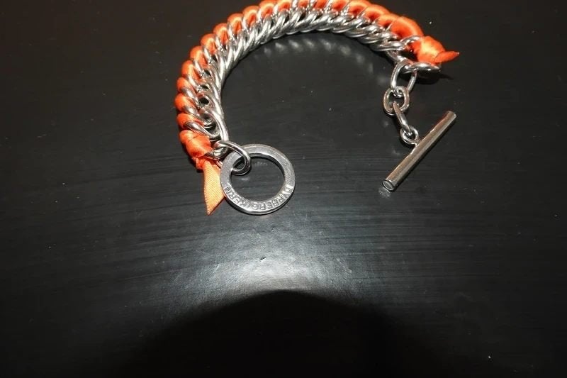 Dyrberg Kern armband zilver kleurig met oranje lintje, Verzenden, Zo goed als nieuw, Zilver, Staal