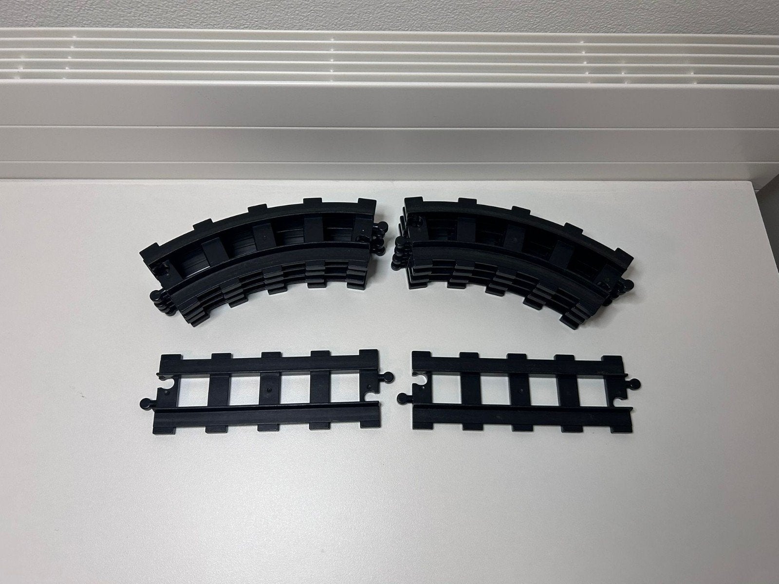 LEGO Duplo 10x lange zwarte rails: 8 kromme en 2 rechte, Ophalen of Verzenden, Zo goed als nieuw, Accessoire, Duplo