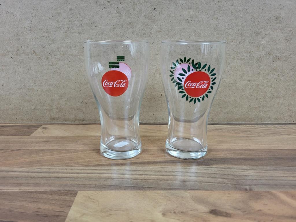 2 Coca-Cola glazen met unieke designs, Ophalen of Verzenden, Gebruikt