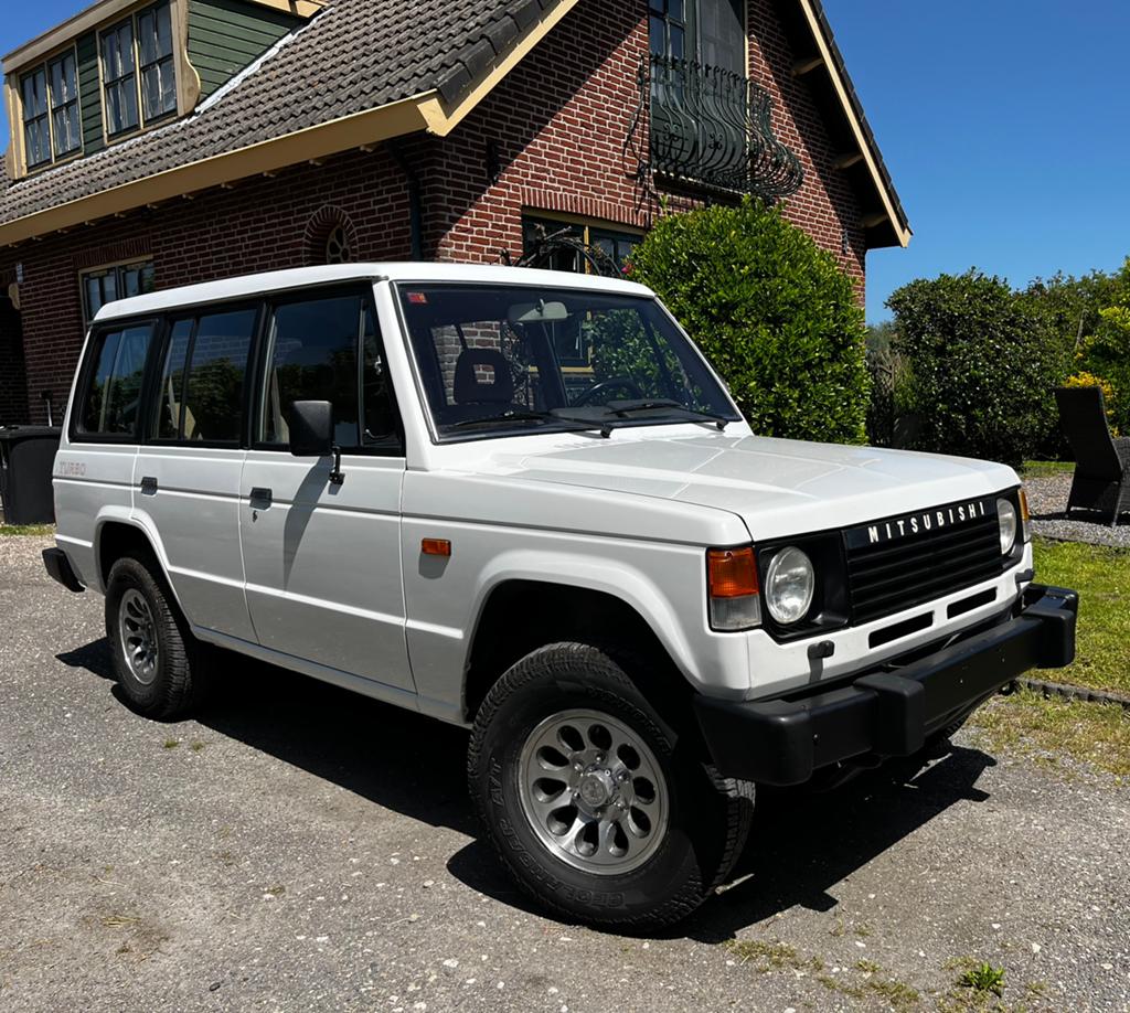 Mitsubishi Pajero Long Mk1 2.5 TD 1987, Auto's, 2500 cc, Trekhaak, 4 cilinders, Wit