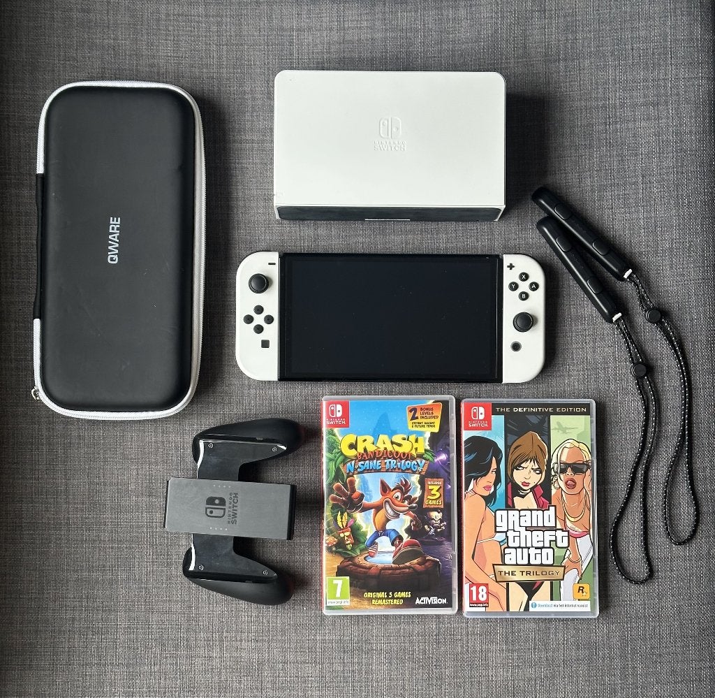 Nintendo Switch OLED + 2 Games + Hoes + Original Accessoires, Met games, Met 2 controllers, Zo goed als nieuw, Switch OLED