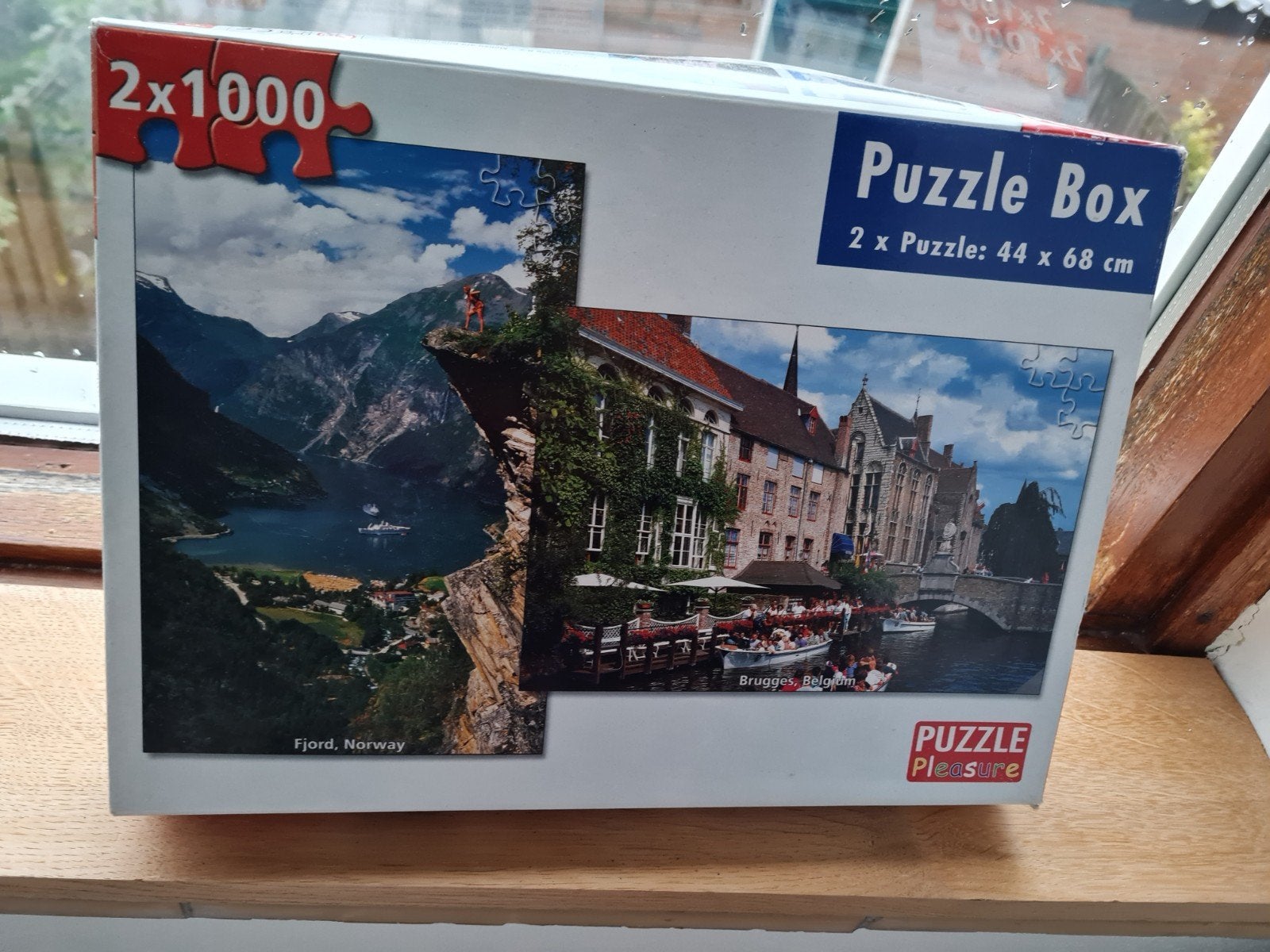 Legpuzzel Box 2x1000 stukjes: Noorwegen & Brugge, Ophalen of Verzenden, 500 t/m 1500 stukjes, Gebruikt, Legpuzzel