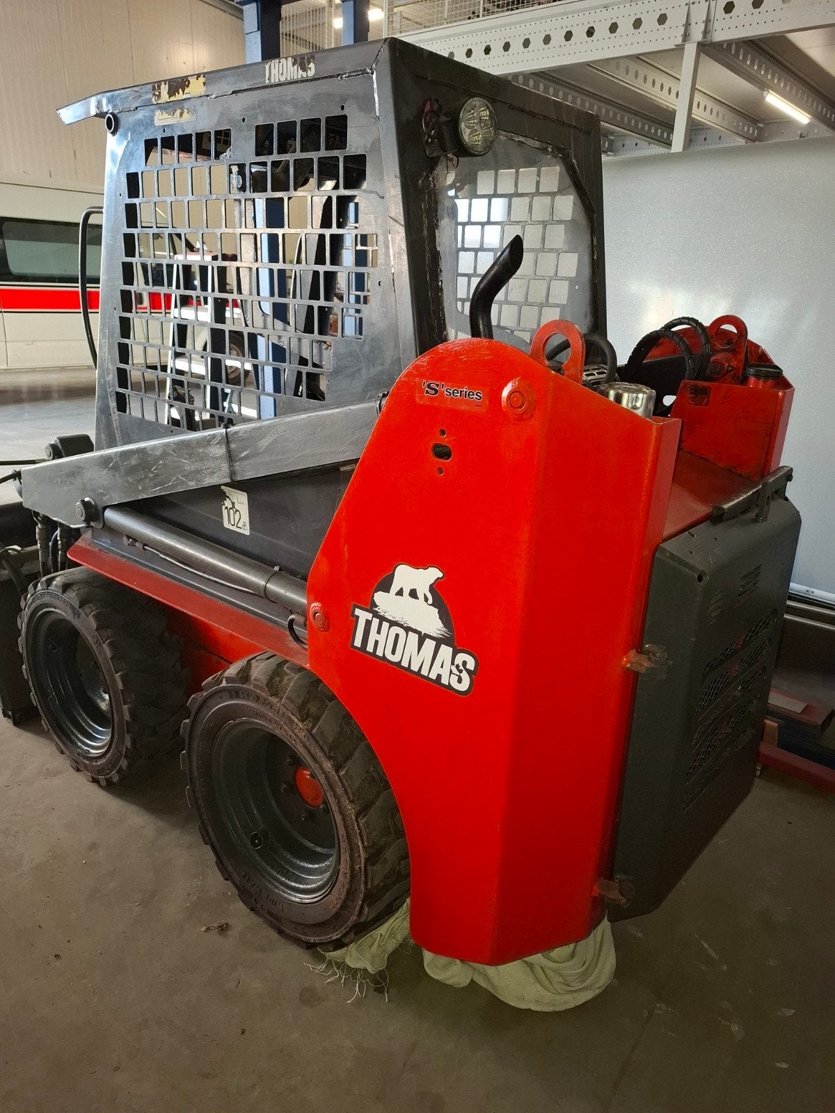 Thomas T85s  Schranklader, Bobcat, Ophalen