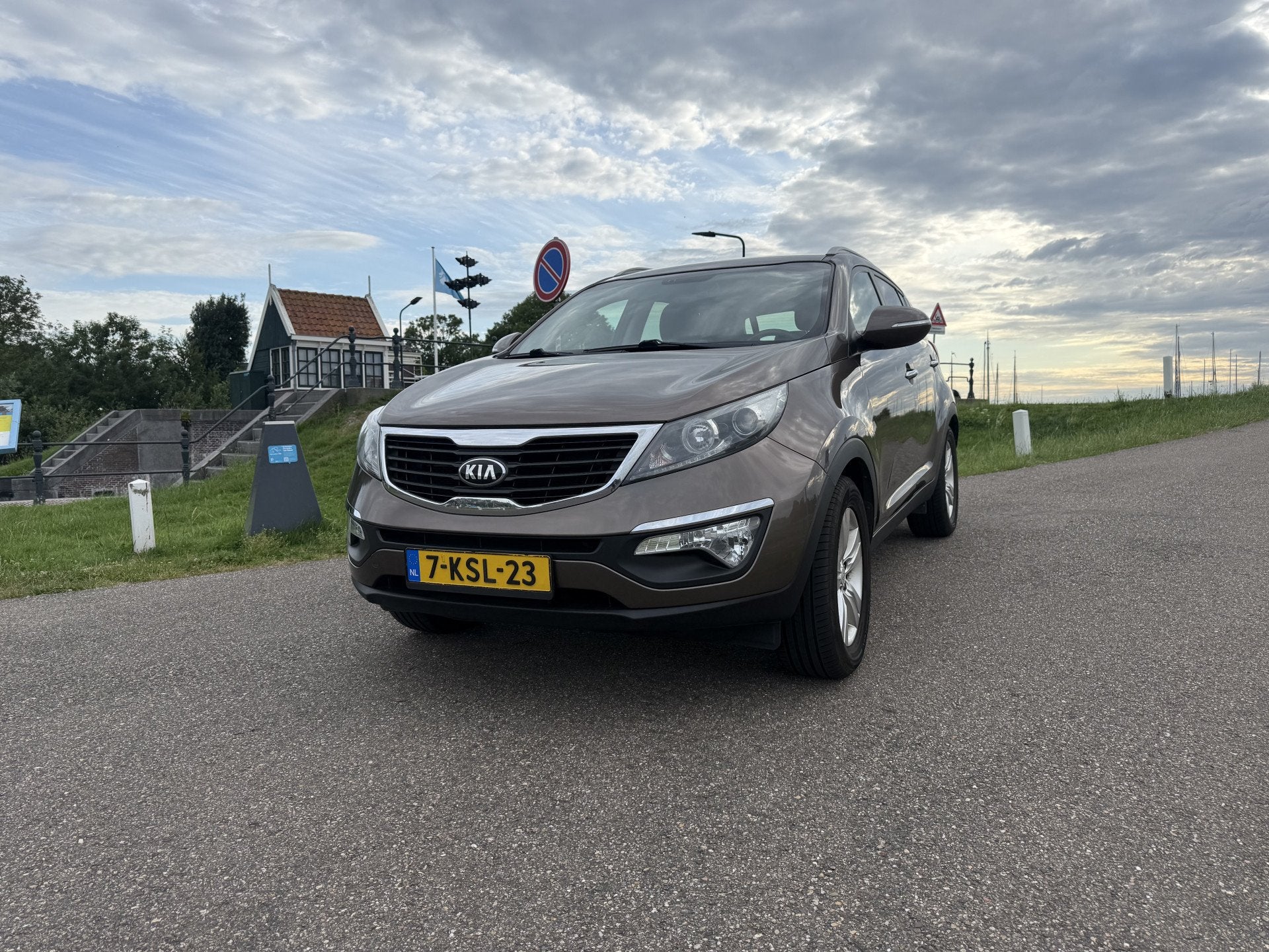 Kia Sportage 1.6 GDI 20th Anniversary bj septemerber2013/par, Auto's, Kia, Voorwielaandrijving, Euro 5, 4 cilinders, Bruin