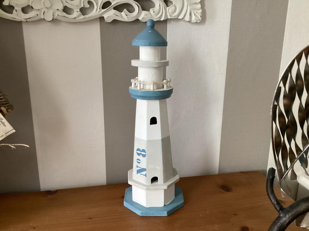Vuurtoren hout zgan, Verzamelen, Beelden en Beeldjes, Ophalen of Verzenden, Zo goed als nieuw, Dier