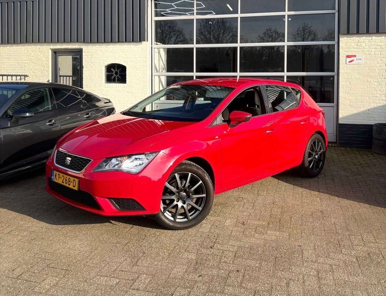 Seat Leon 1.2 TSI 63KW/85PK 2014 Rood, Auto's, Voorwielaandrijving, Stof, 4 cilinders, Leon