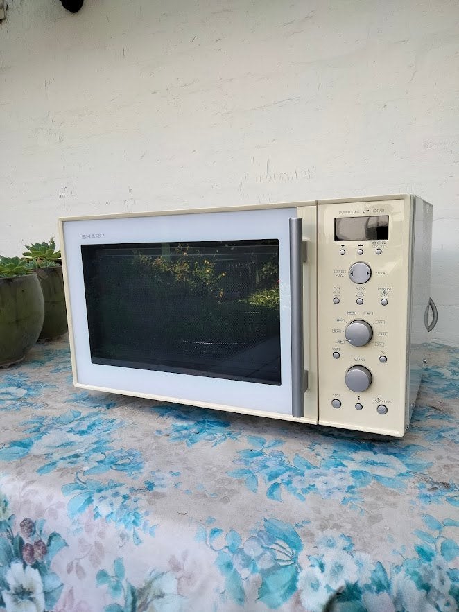 Magnetronoven met boven- en ondergrill, Ophalen, Combimagnetron, Hete lucht, Zo goed als nieuw