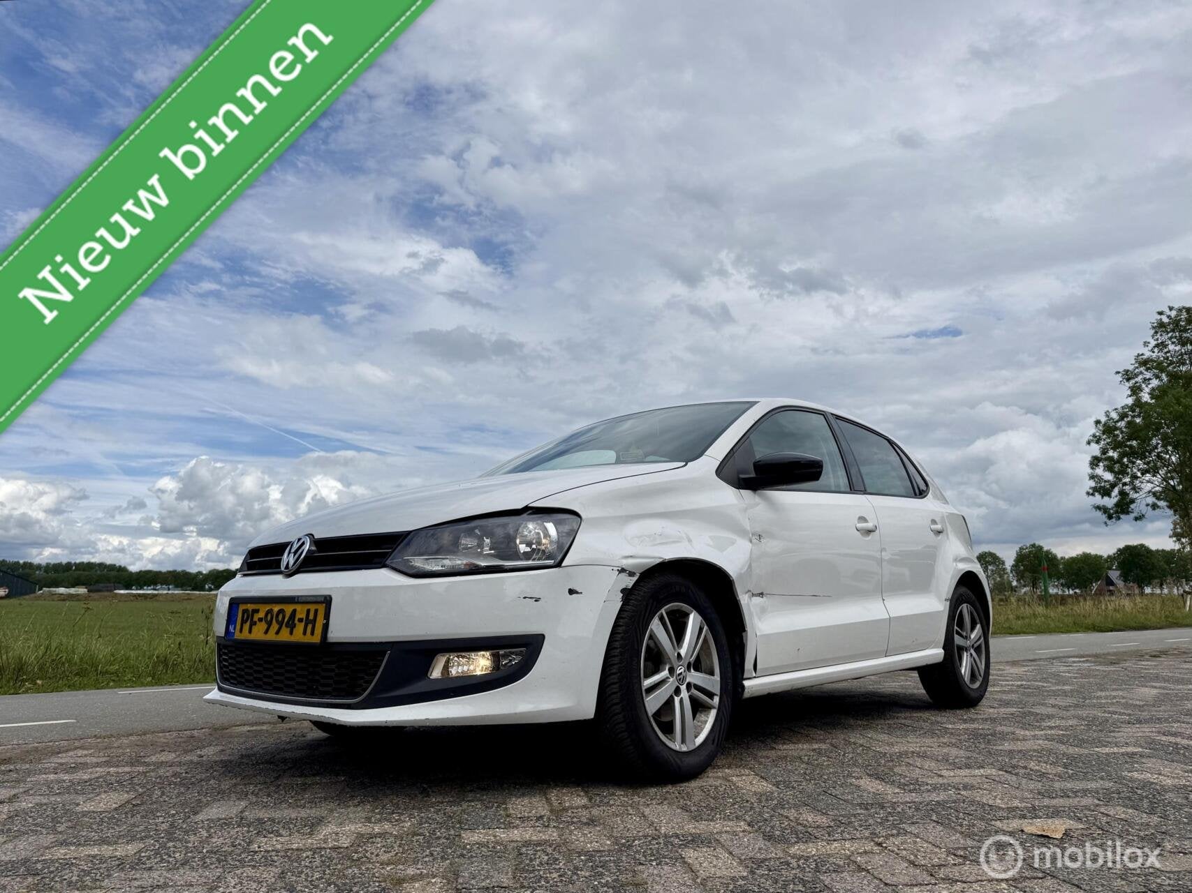 Volkswagen Polo 1.6 TDI BlueMotion Highline, BJ 2013, Export, Auto's, Voorwielaandrijving, Euro 5, Gebruikt, Wit