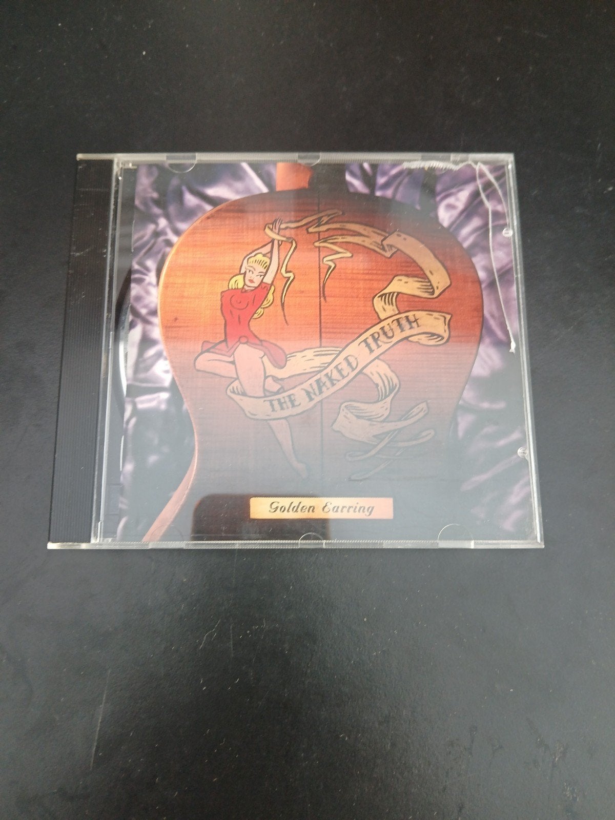Golden Earring - The Naked Truth CD (1992), Inclusief boekje, Gebruikt, Ophalen of Verzenden, Classic Rock