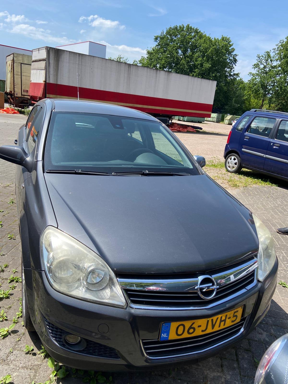 Opel Astra 1.6 van 2009 Grijs, Auto's, Voorwielaandrijving, 15 km/l, 4 cilinders, 635 kg