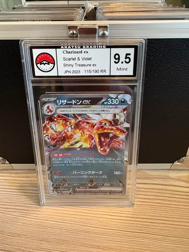 Charizard ex grade 9,5, Ophalen of Verzenden, Zo goed als nieuw, Meerdere kaarten, Foil