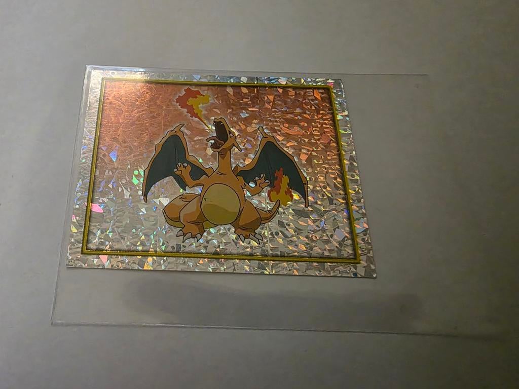 Merlin charizard prism holo , Zeldzaam!, Hobby en Vrije tijd, Verzamelkaartspellen | Pokémon, Ophalen of Verzenden, Zo goed als nieuw