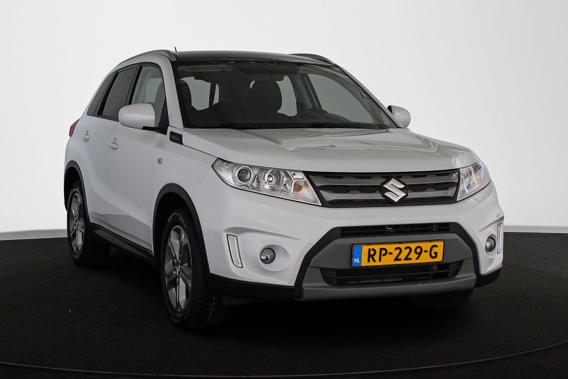 Suzuki Vitara 1.6 Exclusive Navi Camera Apple CarPlay Clima, Auto's, Voorwielaandrijving, Stof, Euro 6, 4 cilinders