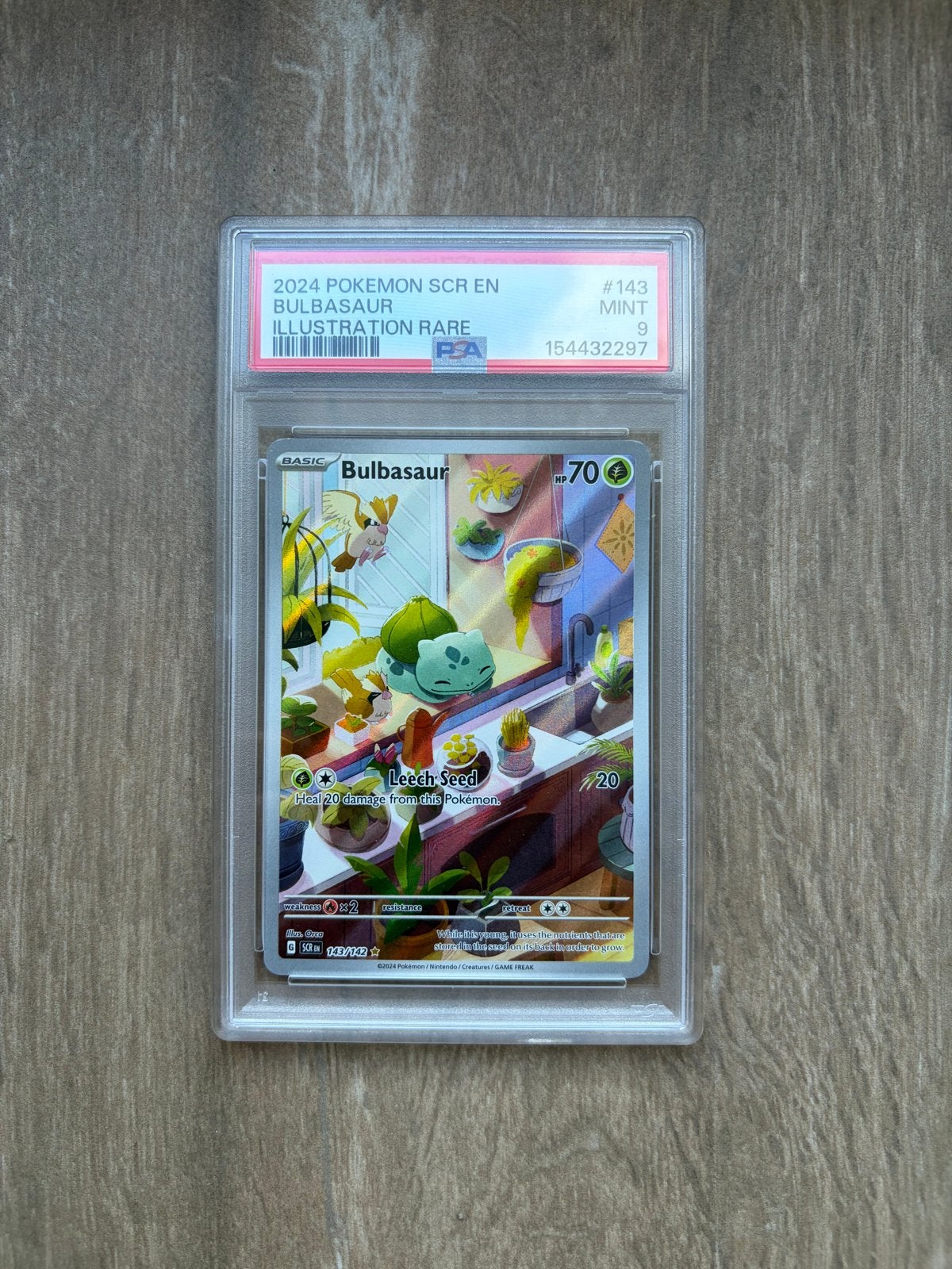 Bulbasaur 143 Stellar Crown 2024 PSA 9, Ophalen of Verzenden, Zo goed als nieuw, Losse kaart