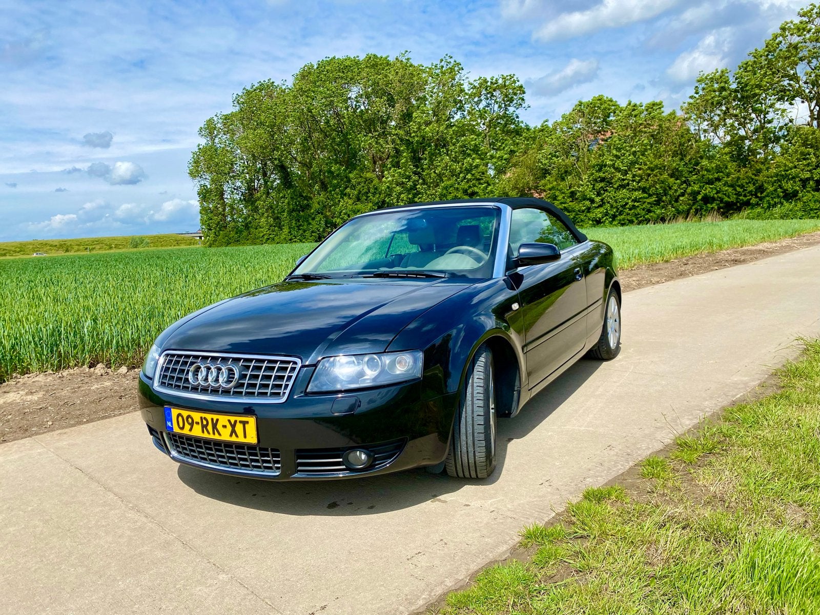 Audi A4 1.8 120KW Cabrio AUT 2005 Zwart, Auto's, Audi, 4 cilinders, Cabriolet, 4 stoelen, A4