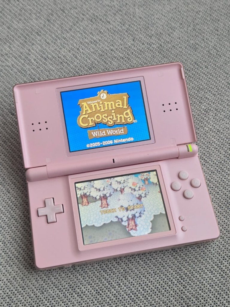 Nintendo DS Lite Roze + Spellen, Met games, Ophalen of Verzenden, Zo goed als nieuw, Roze