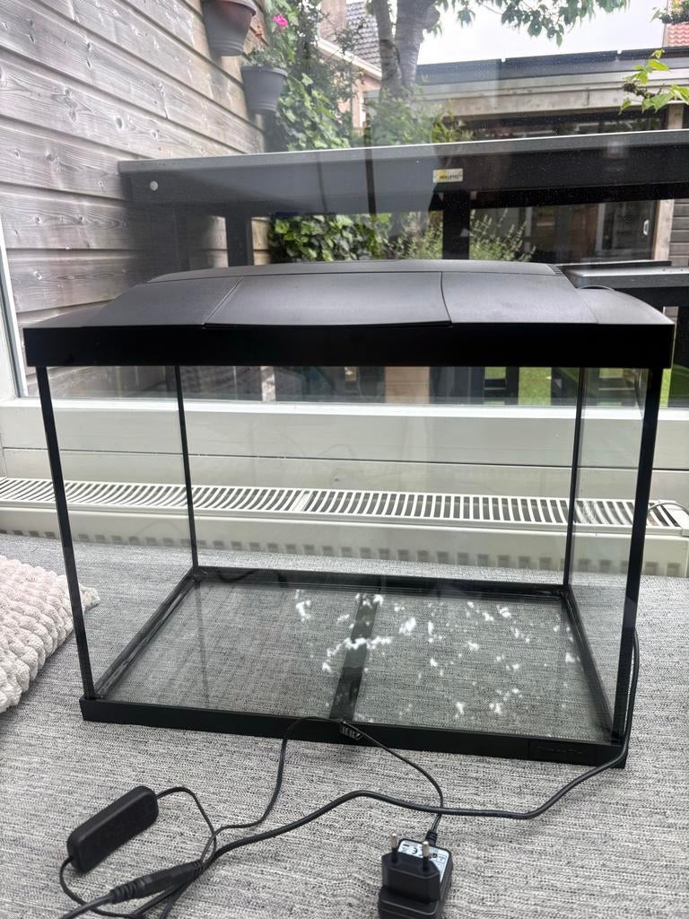 Aquarium met benodigdheden, Ophalen, Leeg aquarium