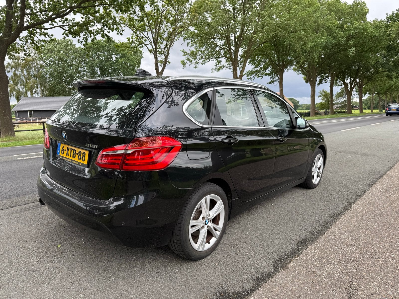 BMW 2-Serie Active Tourer 218i 136pk 2014 Zwart, Auto's, BMW, Particulier, 2-Serie Active Tourer, ABS, Airbags, Airconditioning