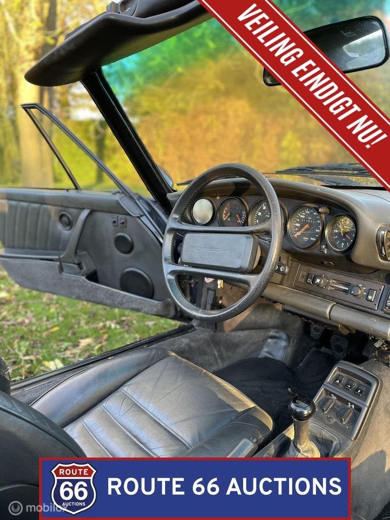 Porsche 911 Carrera 4 Cabriolet | 1990 | Route 66 Auctions, Auto's, Oldtimers, Overige carrosserieën, Zwart, Bedrijf, Porsche