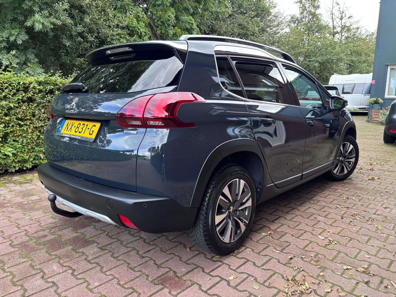 Peugeot 2008 1.2 PureTech Allure, Voorwielaandrijving, Dealer onderhouden, Stof, 1250 kg
