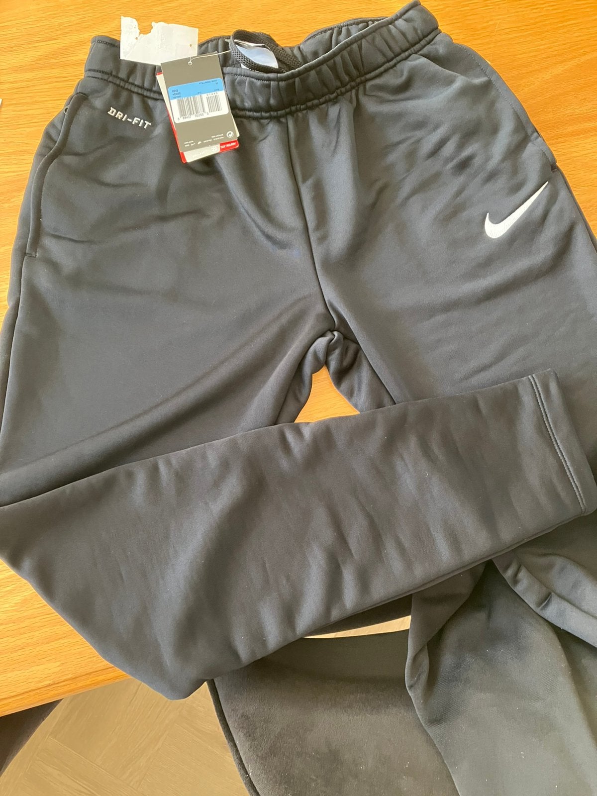 Nike zwart trainingsbroek mt.M nieuw, Ophalen, Maat 48/50 (M), Zwart, Nieuw