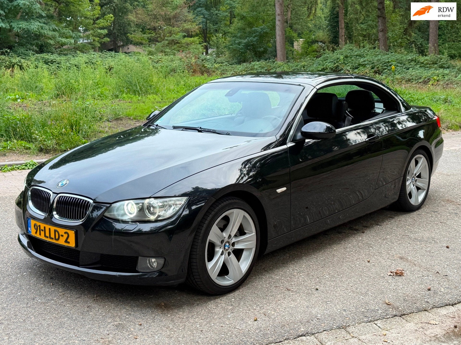 BMW 3-serie Cabrio 325i 2009 Zwart Automaat, Auto's, Dealer onderhouden, Achterwielaandrijving, Gebruikt, Zwart