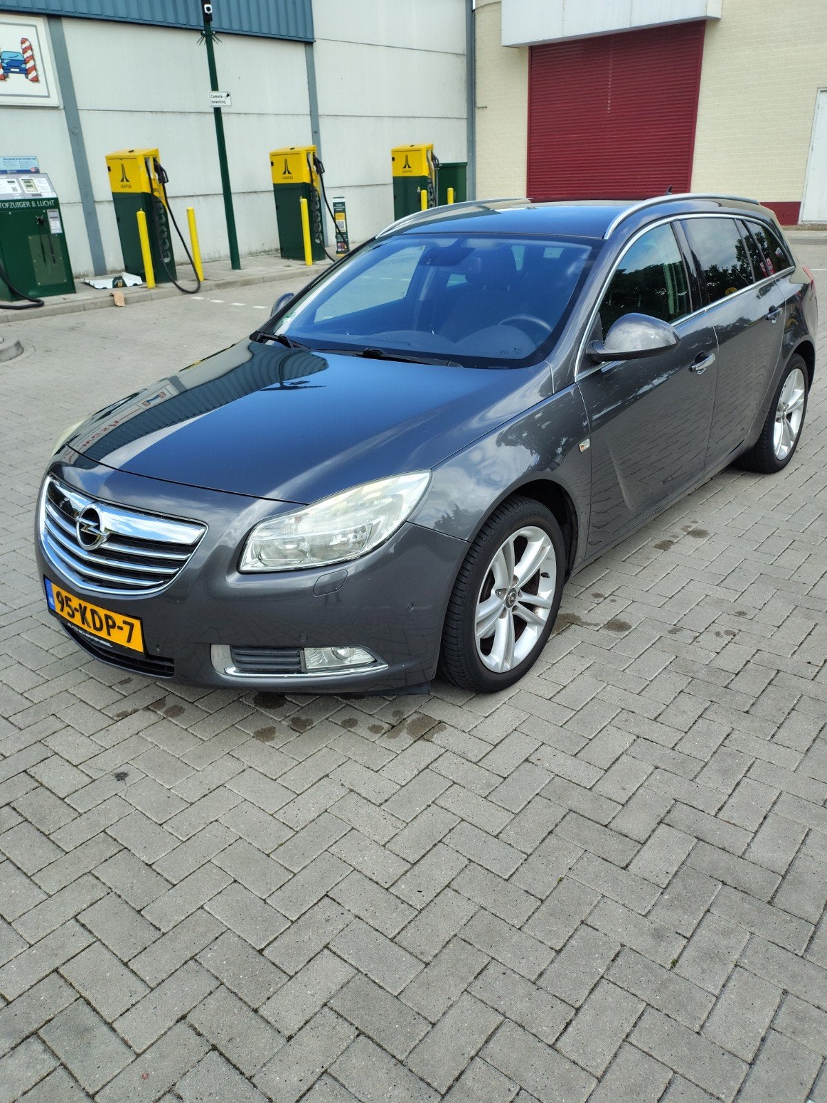 Opel Insignia 1.6 Sports Tourer Turbo Ecotec 180pk 2009, 4 cilinders, 179 pk, Leder en Stof, Origineel Nederlands