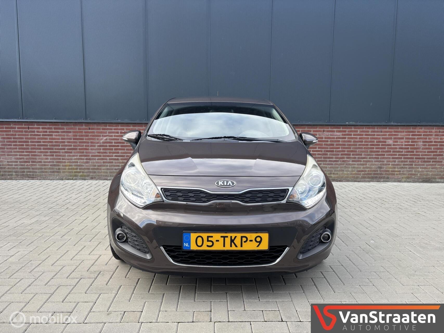 Kia Rio 1.2 CVVT Super Pack | Keyless | Nw motor + koppeling, Auto's, Euro 5, 4 cilinders, Bruin, Origineel Nederlands