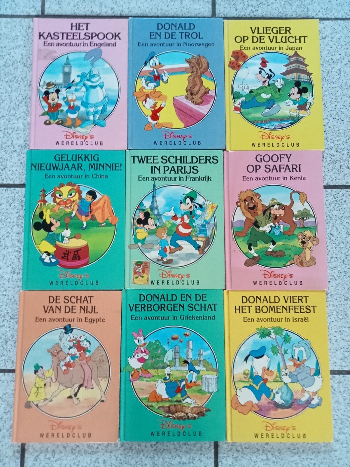 Disney's Wereldclub Boeken - 9 Avonturen Wereldwijd, Ophalen of Verzenden, Gelezen