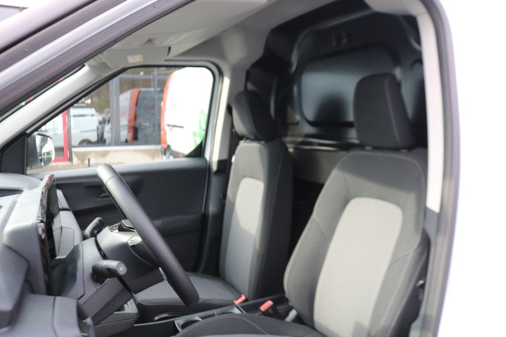 Ford E-Transit Courier 44 kWh Limited Winterpakket, Auto's, Stof, Gebruikt, Wit, 1524 kg