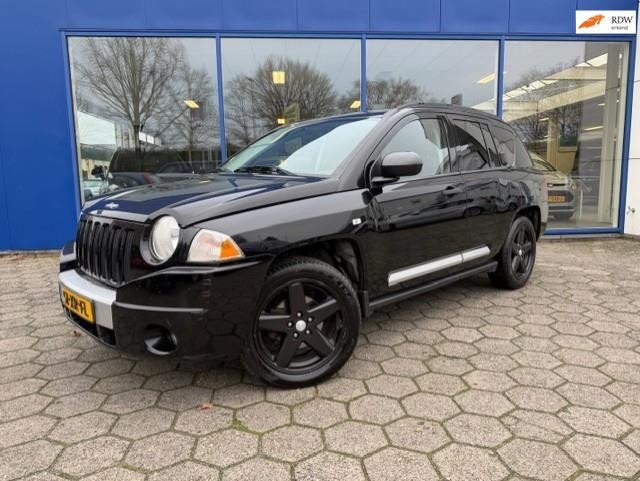 Jeep Compass 2.4 Limited 4x4 / Leder / Trekhaak, Auto's, Jeep, 450 kg, Gebruikt, 4 cilinders, Zwart