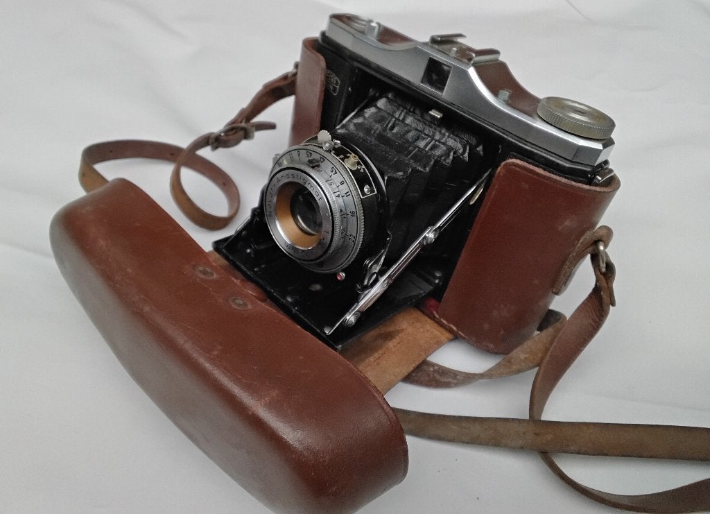 Vintage foto camera Zeiss Ikon in bruin lederen tas, Ophalen, Zo goed als nieuw, Compact, Overige Merken