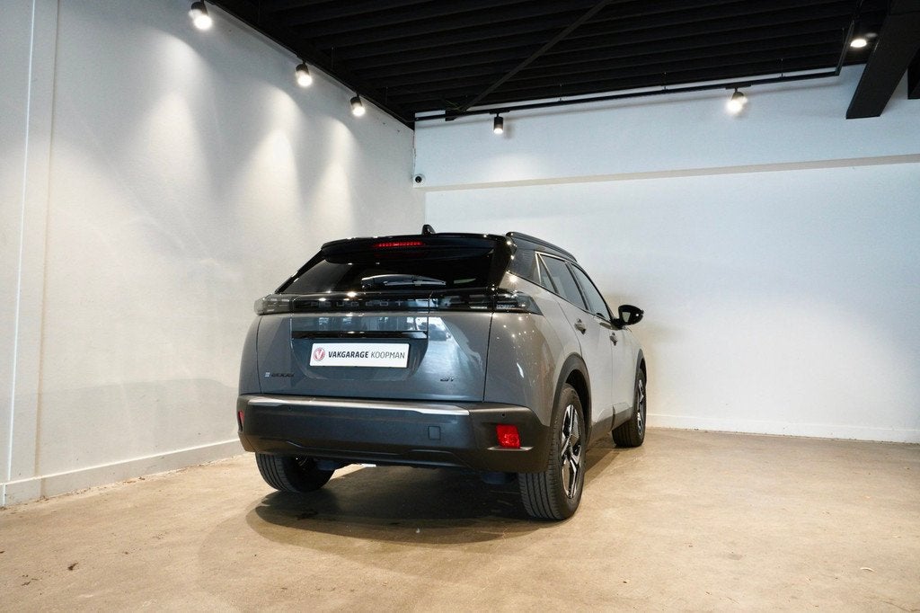 Peugeot E-2008 EV GT 54 kWh, Auto's, Peugeot, Zwart, 156 pk, Leder en Stof, Origineel Nederlands