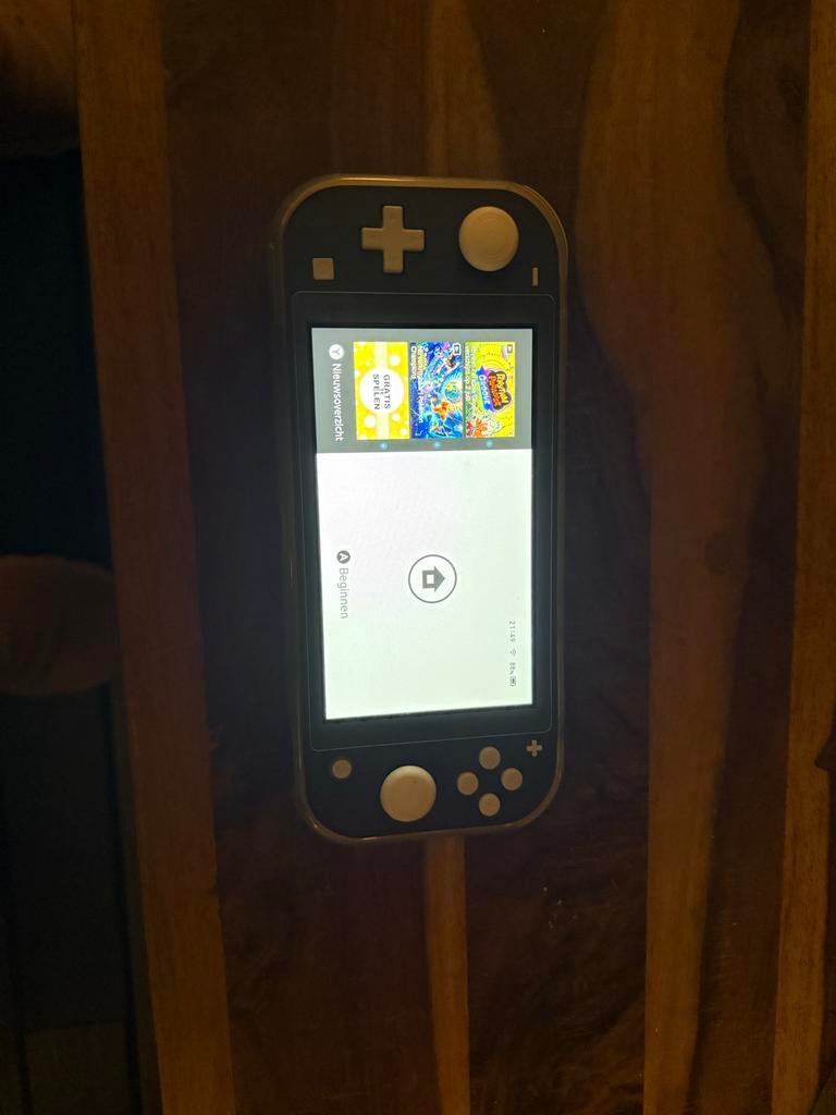 Nintendo Switch Lite Grijs + 4 spellen + screenprotector, Spelcomputers en Games, Spelcomputers | Nintendo Switch Lite, Ophalen of Verzenden