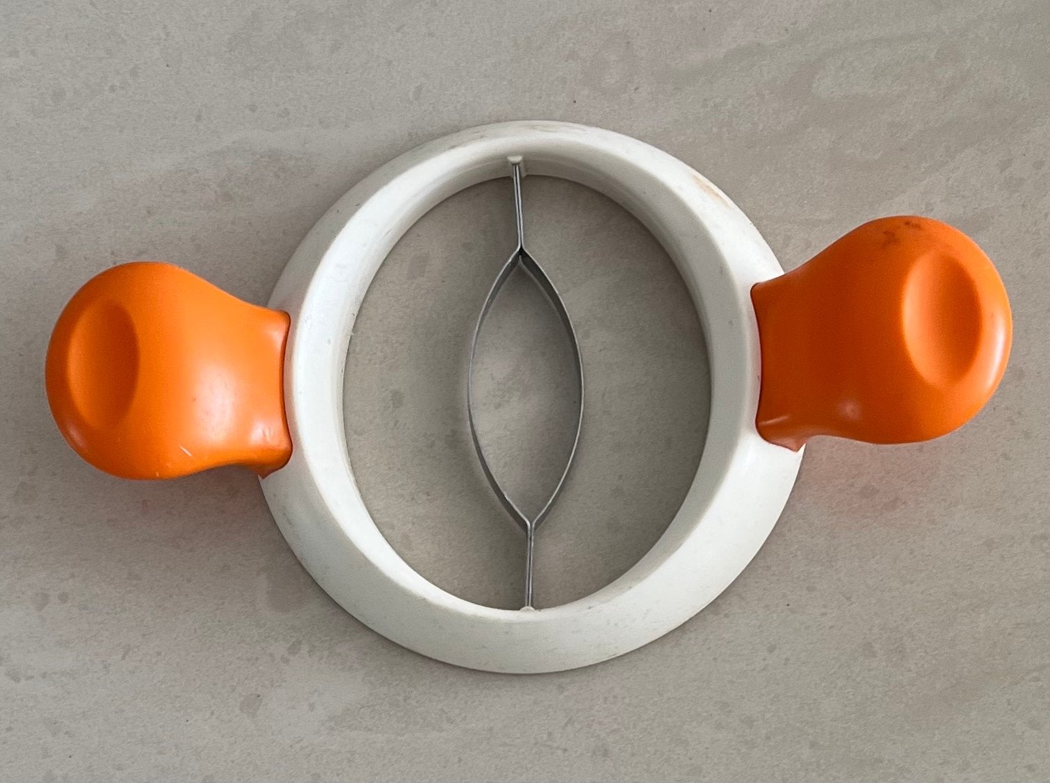 mango-snijder- ontpitter met oranje handvatten, Ophalen of Verzenden, Zo goed als nieuw