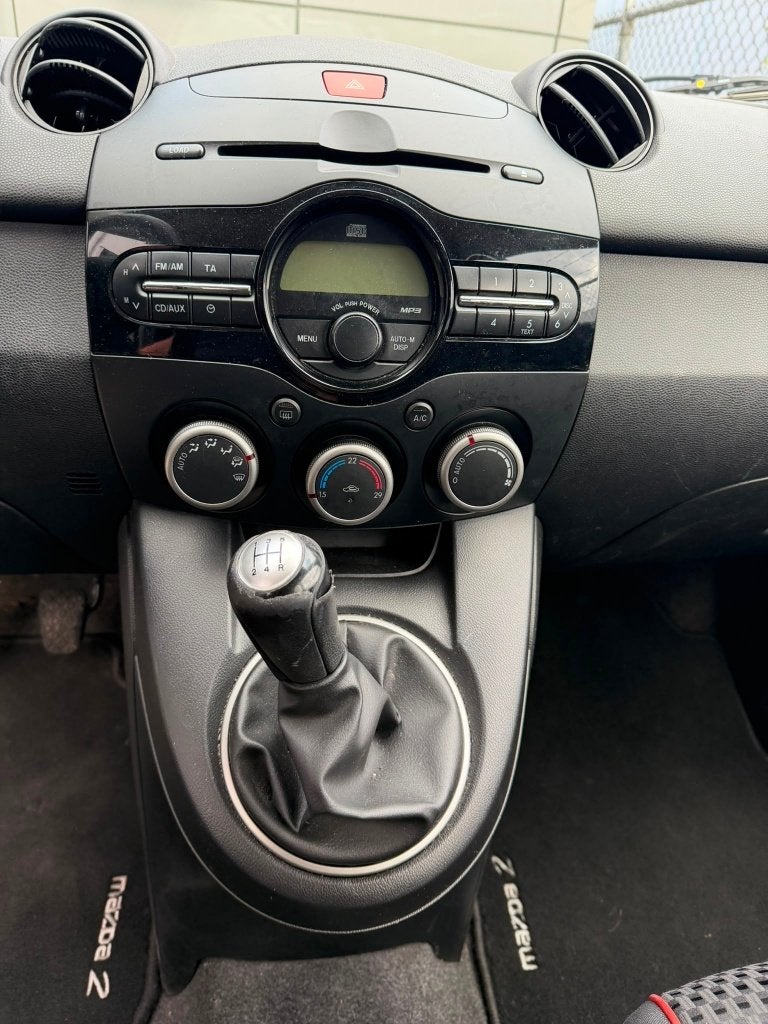 Mazda 2 1.5 75KW 5-DRS 2011 Grijs, Auto's, Mazda, Stof, 1498 cc, 31 €/maand, 4 cilinders
