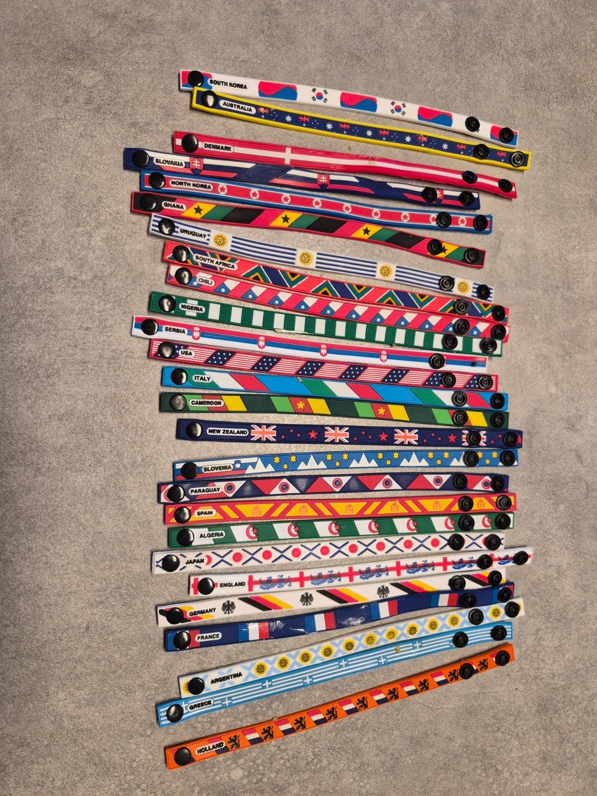 Nieuwe landenarmbandjes - Wereldvlaggen collectie, Ophalen of Verzenden, Nieuw