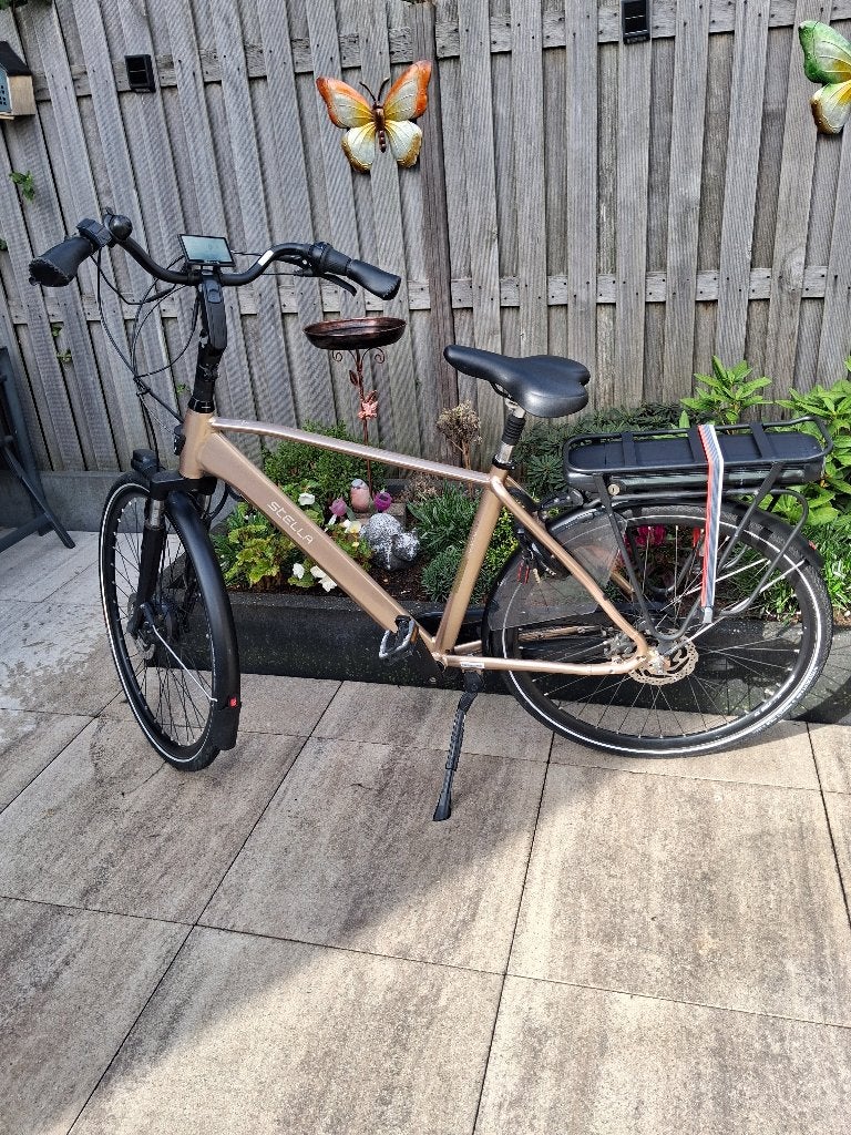 Te koop aangeboden Stella E-Bike, Fietsen en Brommers, Elektrische fietsen, Zo goed als nieuw, 50 km per accu of meer, 55 tot 59 cm