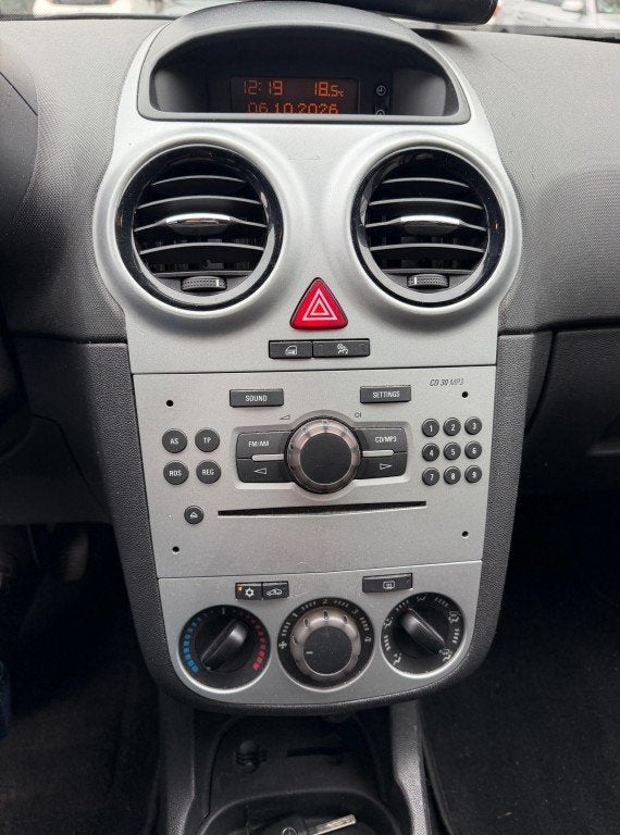 Opel CORSA 1.4-16V Enjoy 2DE EIG. KOUDE AIRCO RIJDT GOED NAP, Auto's, Gebruikt, 4 cilinders, 49 €/maand, Bedrijf