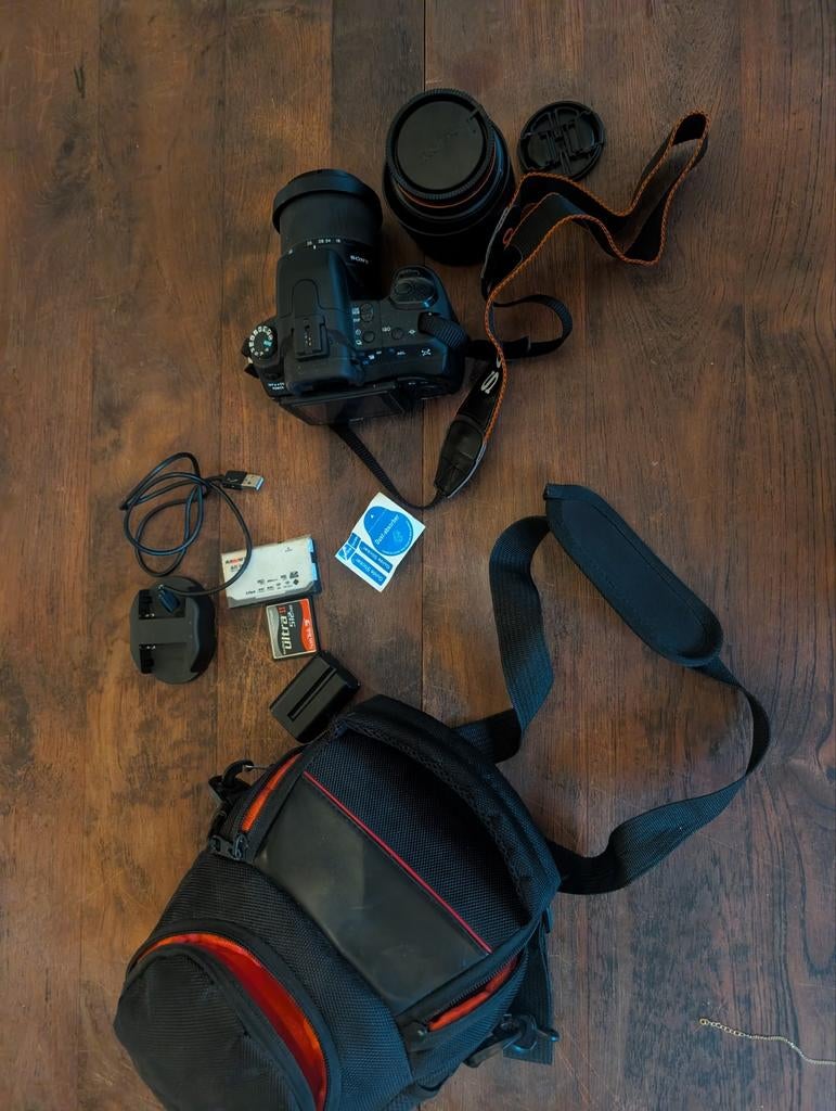 Sony a350 DSLR met accesoires en lenzen., Ophalen of Verzenden