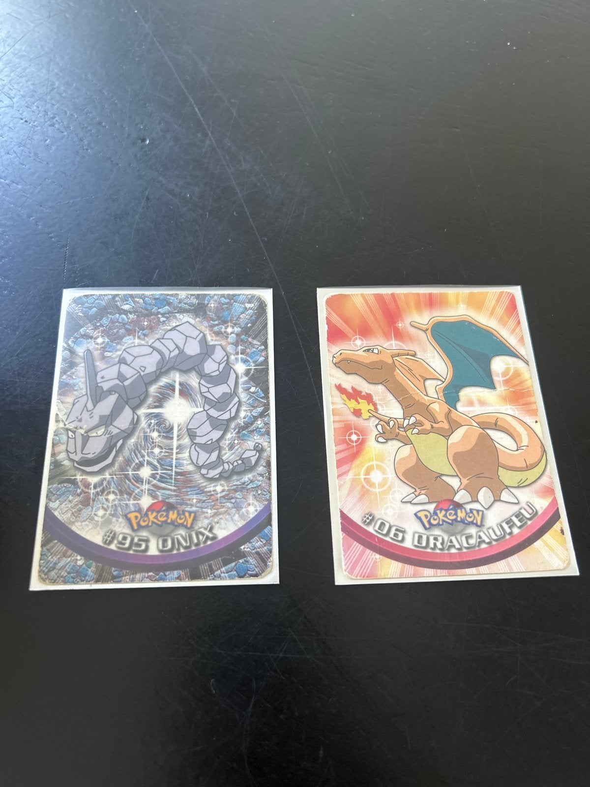 Pokémon kaarten: Onix en Charizard (Dracaufeu), Ophalen of Verzenden, Gebruikt, Meerdere kaarten
